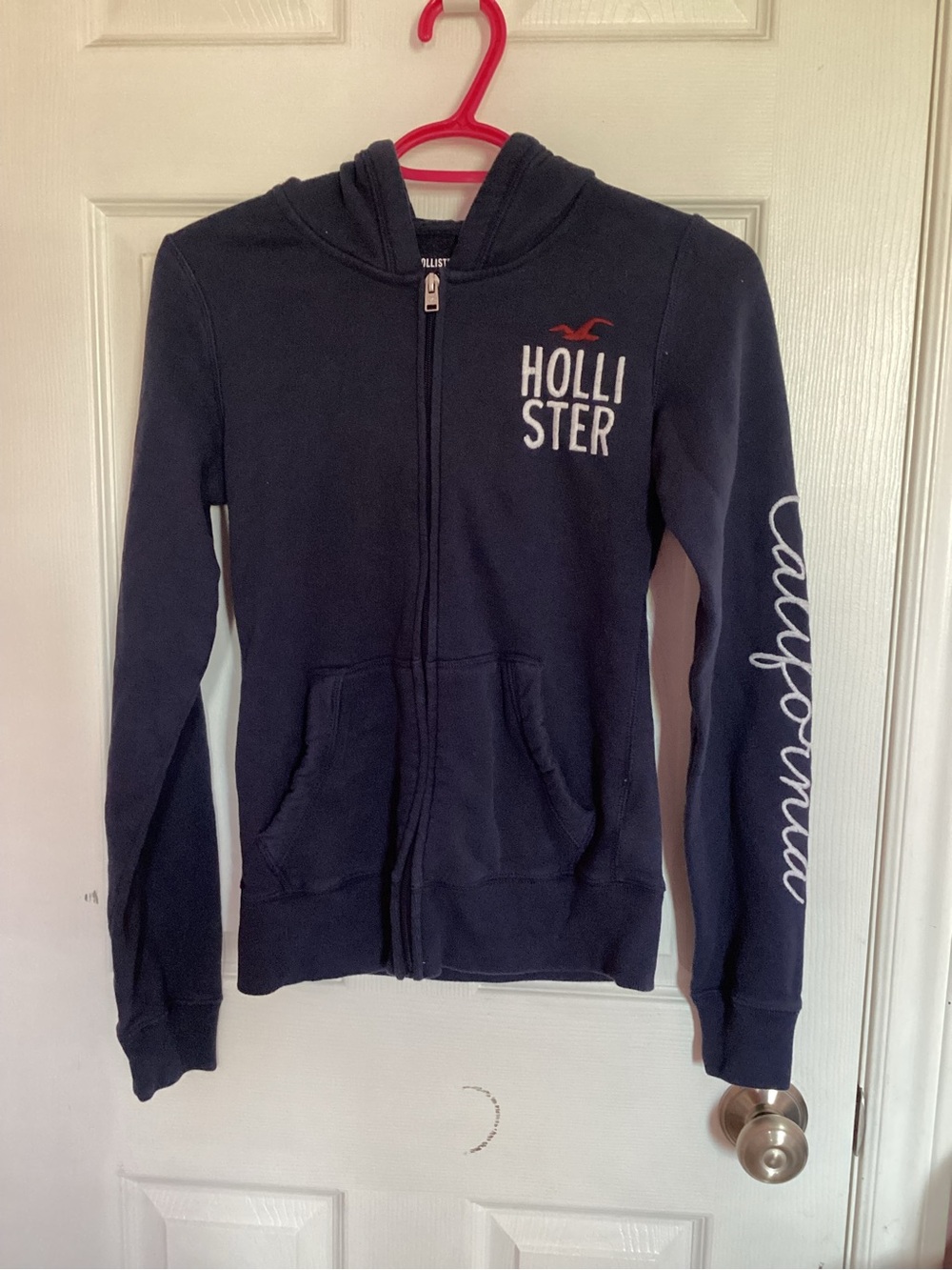 Hollister Dark Blue Zip Hoodie with White Script